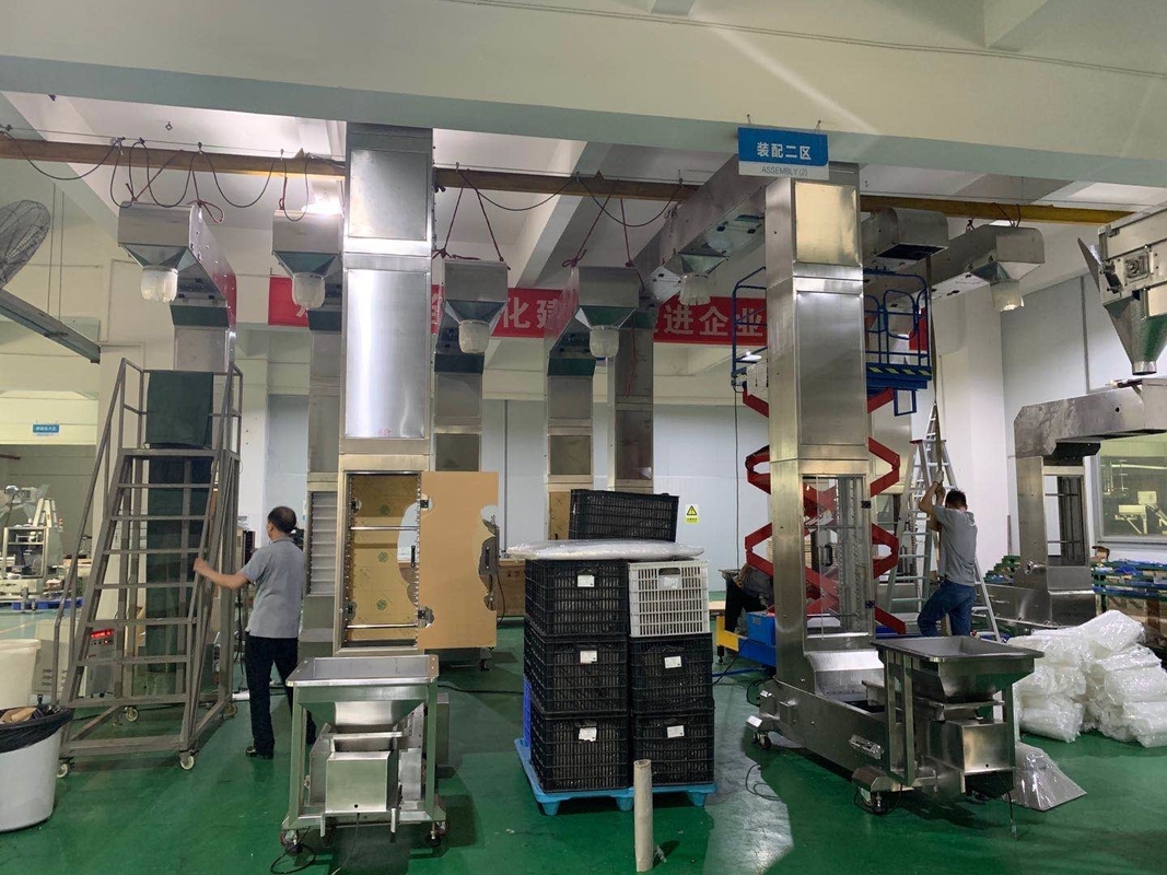 ลิฟต์ถังชนิด Z แบบกำหนดเองที่ทำงานร่วมกับระบบการบรรจุเครื่องชั่งแบบหลายหัว