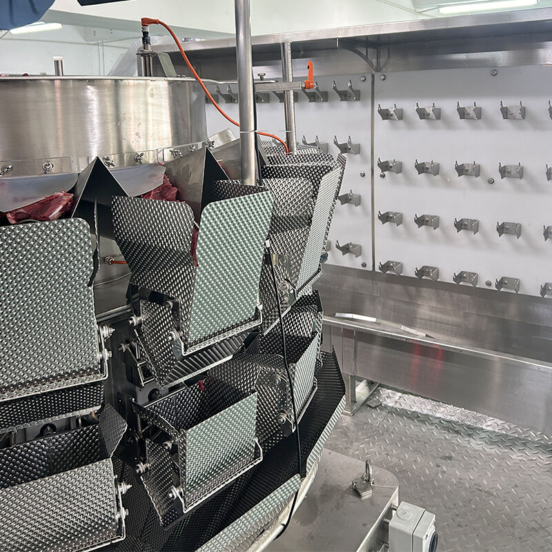 สายการบรรจุถาดอัตโนมัติสำหรับผลิตภัณฑ์แช่แข็งพร้อมเครื่องชั่งน้ำหนักแบบหลายหัวและสกรูลำเลียง