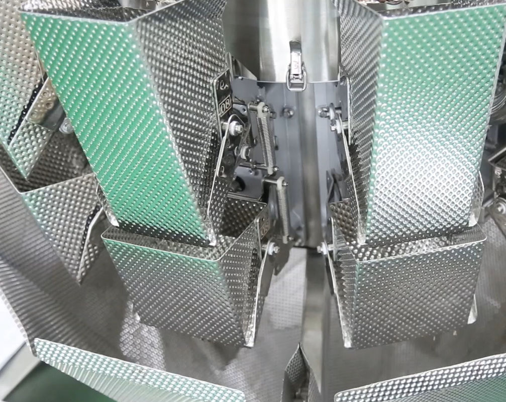 14 Mutihead Weigher VFFS เครื่องบรรจุภัณฑ์ประเภทชามลิฟท์สำหรับช็อกโกแลตถั่วผลไม้แช่แข็ง