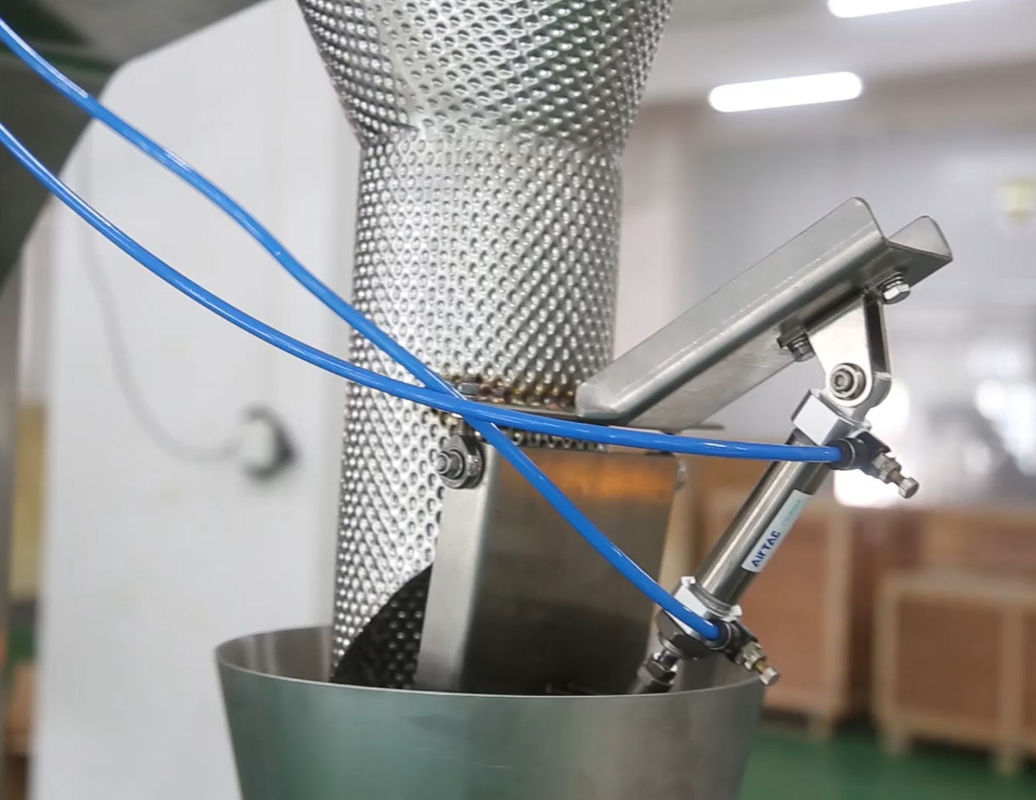 14 Mutihead Weigher VFFS เครื่องบรรจุภัณฑ์ประเภทชามลิฟท์สำหรับช็อกโกแลตถั่วผลไม้แช่แข็ง